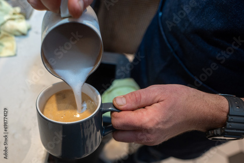 pouring coffee into a cup