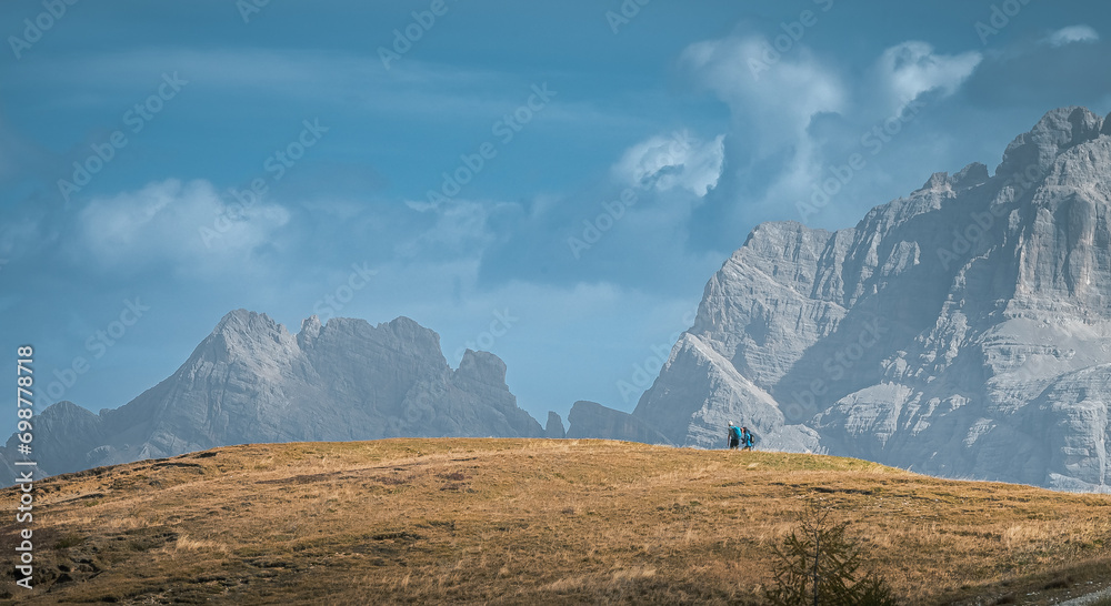Stunning Italian Dolomites in vibrant colors. Picturesque Alpine mountain range at summer time.