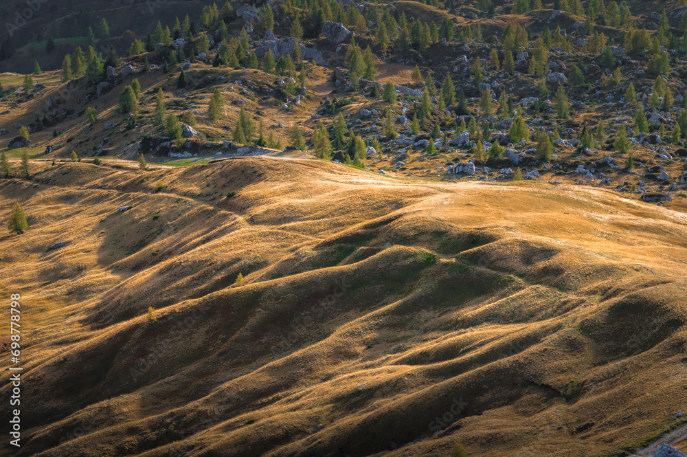 Stunning Italian Dolomites in vibrant colors. Picturesque Alpine mountain range at summer time.