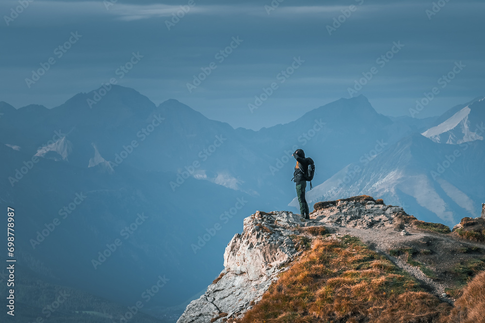 Stunning Italian Dolomites in vibrant colors. Picturesque Alpine mountain range at summer time.