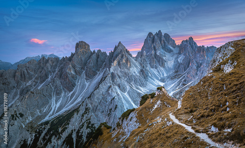 Obraz na płótnie Stunning sunset with colorful sky at Italian Dolomites. Impressive Cadini di Misurina mountain range in autumn colors.
w salonie