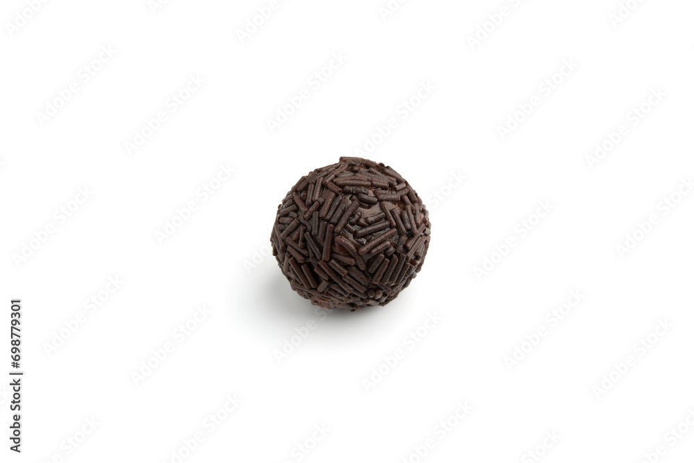 Typical Brazilian sweet brigadeiro. One chocolate candy on a white background Typical Brazilian sweet brigadeiro. One chocolate candy on a white background