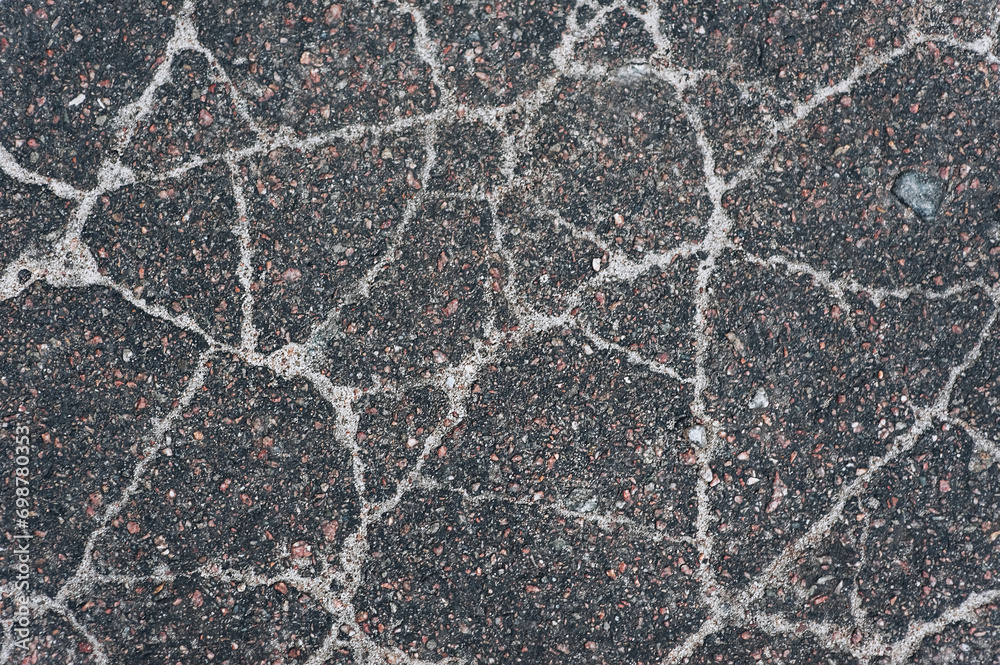 Background, texture, top view of wet asphalt with cracks on the road. Photography, abstraction. - obrazy, fototapety, plakaty 