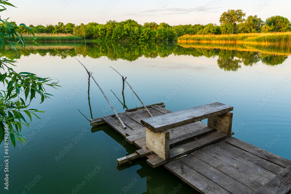 Fishing spot in the village. Background with selective focus and copy space Fishing spot in the village. Background with selective focus and copy space