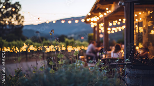 A romantic vineyard in Napa Valley at sunset with bokeh lights illuminating the outdoor dining area as couples savor fine wines and gourmet cuisine