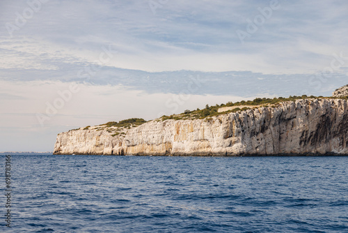 Island in the sea with high cliffs