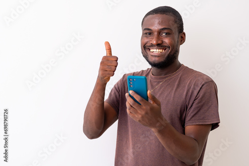 African man holding cellphone
