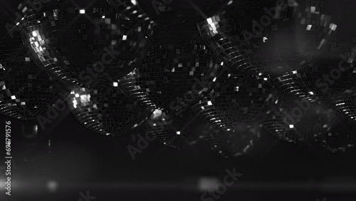 Mirror balls and stage lights at party