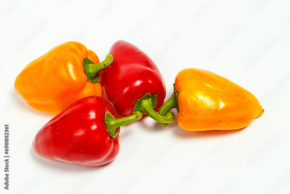 Red and yellow bell pepper on a white background Red and yellow bell pepper on a white background