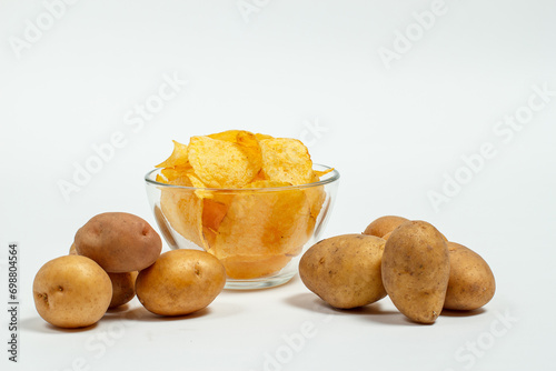 Crispy and salty chips on a white background