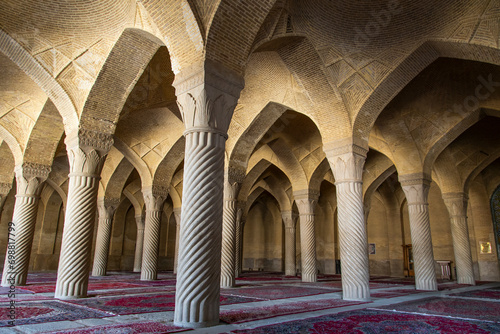 Magnificent brick arches and limestone pillars of Vakeel  mosque in Shiraz, Iran. photo