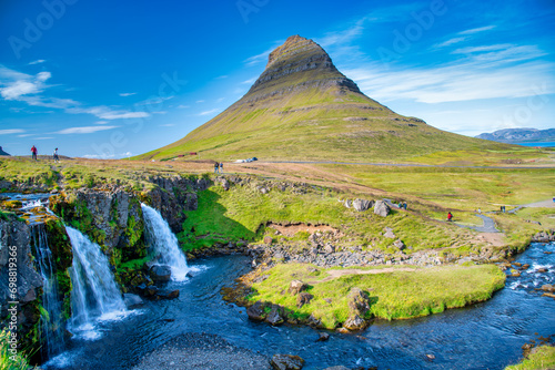 Kirkjufellfoss waterfalls on a sunny day, Iceland