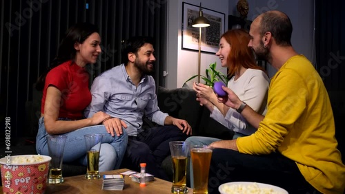 Moments when four friends gather at home, play games together, and have fun