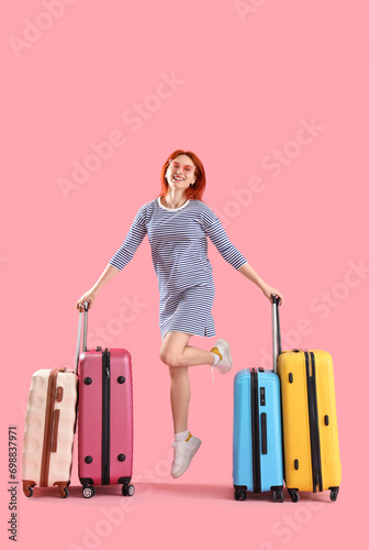 Jumping female tourist with...
