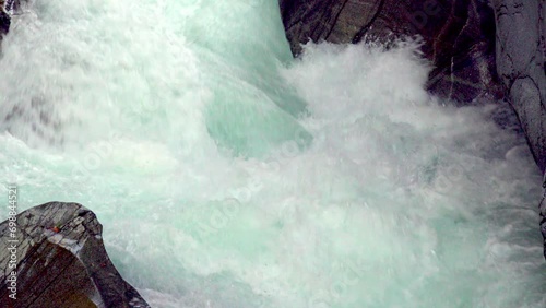 Part of a rushing and foaming torrent. The river Passer in the Gilfschlucht gorge in Meran - Merano, South Tyrol, Italy photo