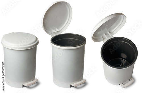 set of pedal bins or pedal trash cans, indoor waste disposal containers that have foot pedal mechanism for hands free operation, used in kitchens, bathrooms or offices, isolated on white background photo