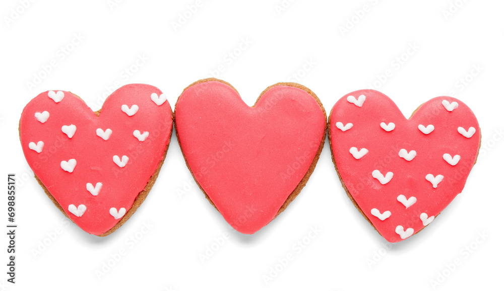 Red heart shaped cookies on white background. Valentine's Day celebration Red heart shaped cookies on white background. Valentine's Day celebration