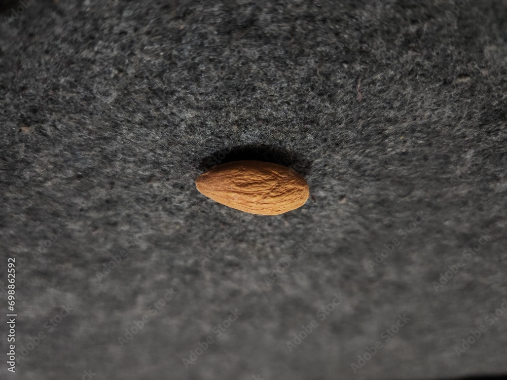 Fototapeta premium A top view brown almonds