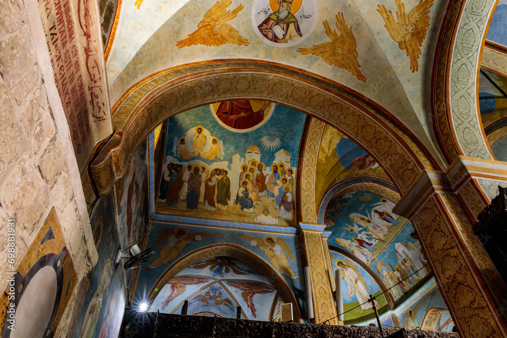 Walls painted on a religious theme in main hall of the Greek Orthodox Church of the Annunciation in Nazareth old city in northern Israel