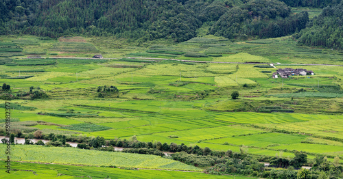 Aerial view of village and farmland