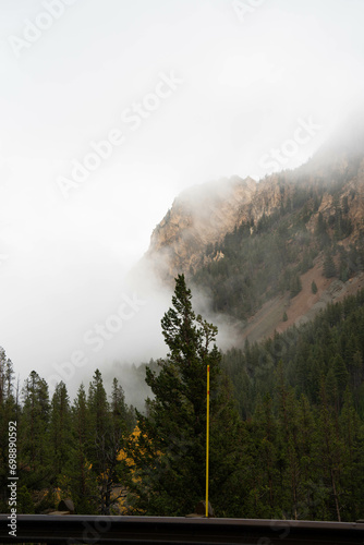 Grand Teton National Park at Wyoming, Mountain side on a foggy day © Stan