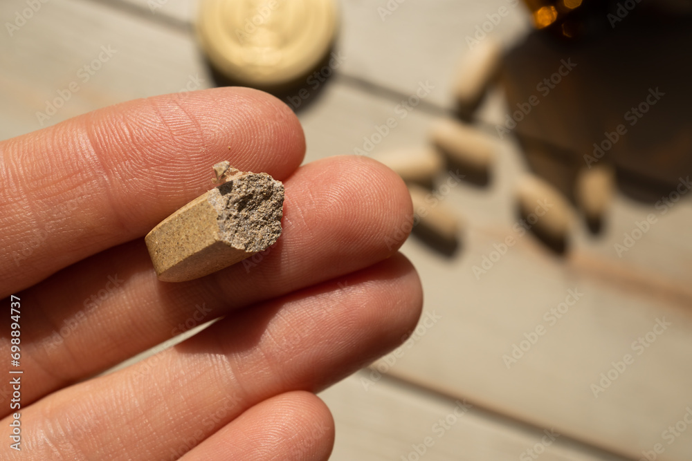 Fototapeta premium a handful of pills in hands