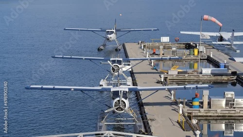 Float Planes Moored at the Vancouver Harbour Flight Centre - Sunny Day photo