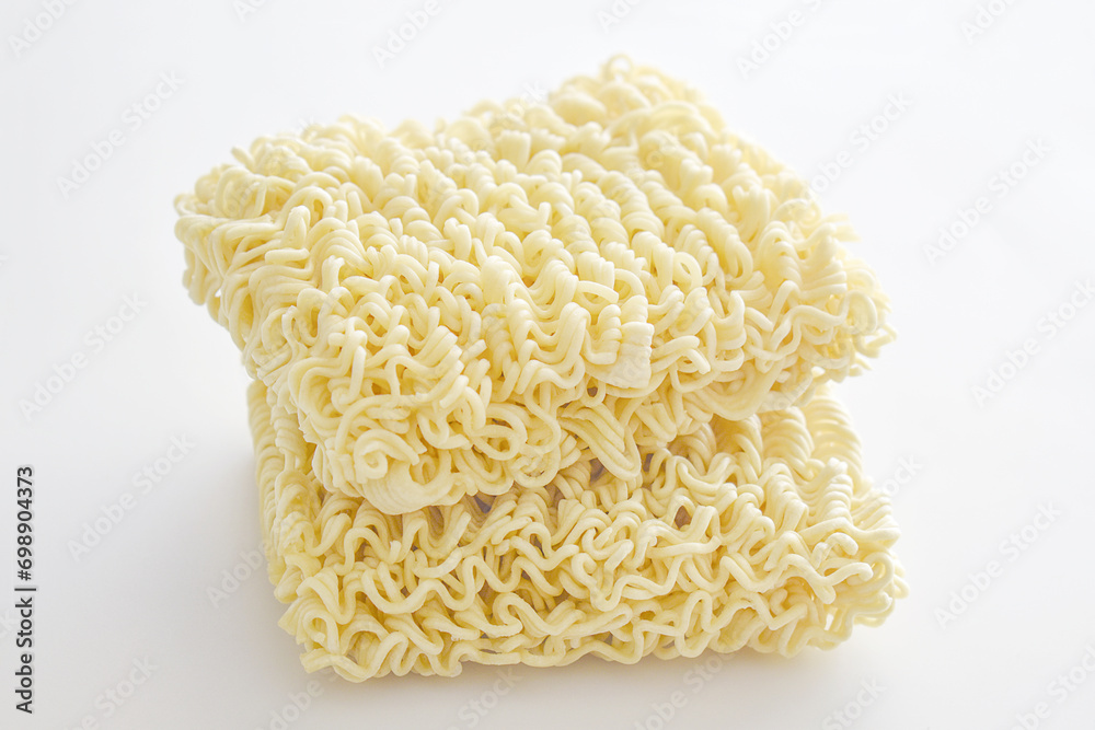 Uncooked instant noodles on the table. Uncooked instant noodles on the table.