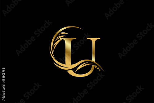 Gold letter U logo design with beautiful leaf, flower and feather ornaments. initial letter U. monogram U flourish. suitable for logos for boutiques, businesses, companies, beauty, offices, spas, etc