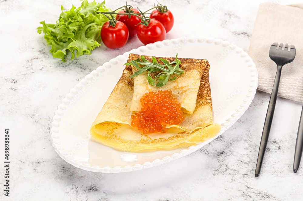 Russian pancake with red caviar Russian pancake with red caviar