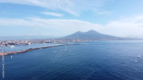 Majestic Mount Vesuvius Seen Across The Gulf Of Naples In Campania, Italy. wide aerial shot photo