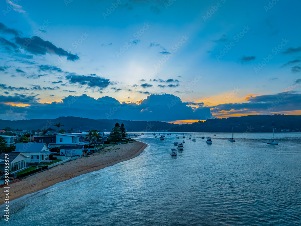 Obraz premium Aerial sunrise over Brisbane Water between Ettalong Beach and Wagstaffe