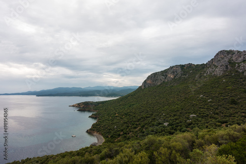 Stunning view to the sea from the hills around Toroni village, Chalkidiki, Greece, under a cloudy sky in autumn