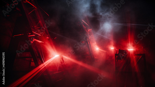 Laser level tool red light beams in smoke