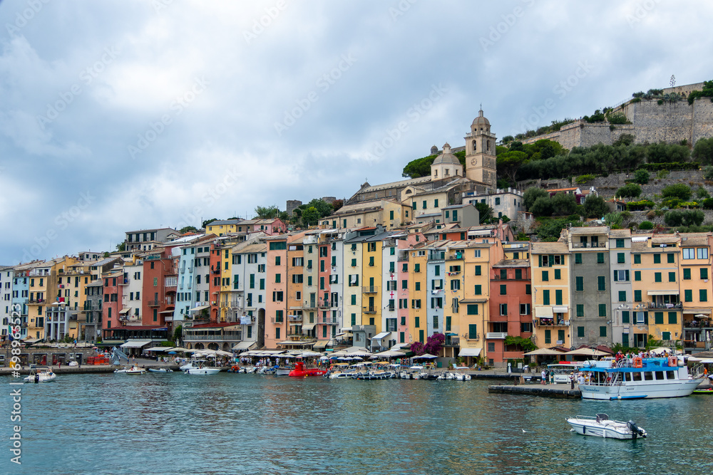 Portovenere, Italy, July 30, 2023. View, from the sea, of the village of Portovenere with the Doria castle