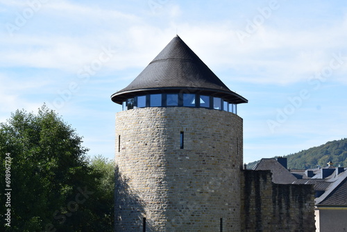round city walls tower with glass  photo