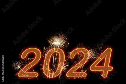 2024 new year red fireworks on black sky background. New year celebration