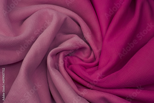 Pink cloth background.