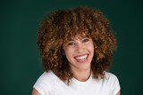 beautiful smiling curly young woman
