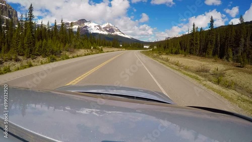 Driving along an empty road in the Icefileds Parkway , Alberta, Canada  photo