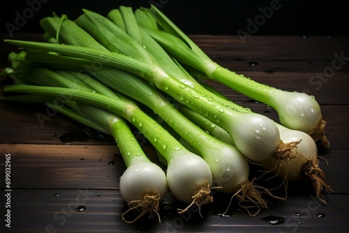 Crisp green onions, a vibrant addition to culinary creations photo