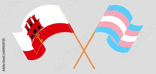 Crossed and waving flags of Gibraltar and Transgender Pride