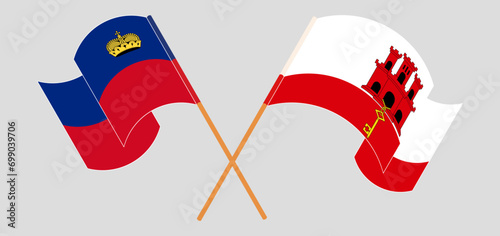 Crossed and waving flags of Liechtenstein and Gibraltar