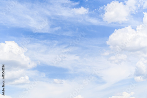 White clouds in a bright blue sky. The beauty of the nature