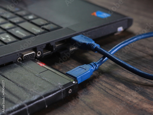 blue usb cable conected hard disk and the laptop