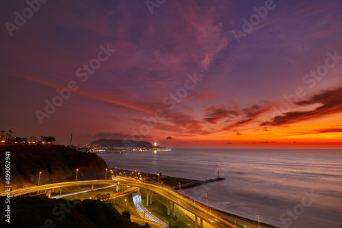 At sunset, Miraflores offers stunning views of the ocean, cliffs, and the vibrant colors in the sky. One of the most iconic places to enjoy the sunset in Miraflores is the Malecón de Miraflores. © Beto