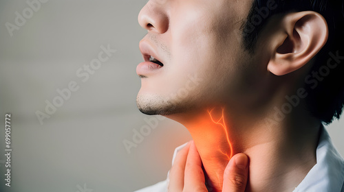 Flame at neck of a man. Concept of sore throat, pharyngitis, laryngitis, thyroiditis, choking photo