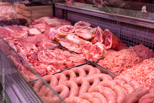 Sumy, Ukraine - December 21, 2023: Meat products store. Sausages on display at a grocery store.