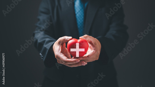 Red cross stands as a powerful symbol, embodying the concept of humanitarian help and health assistance, a universal emblem synonymous with aiding humanity in times of need. photo