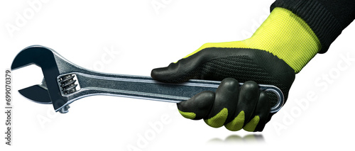 Manual worker with protective work gloves holding a stainless steel adjustable wrench, isolated on white or transparent background with reflections. Png. photo